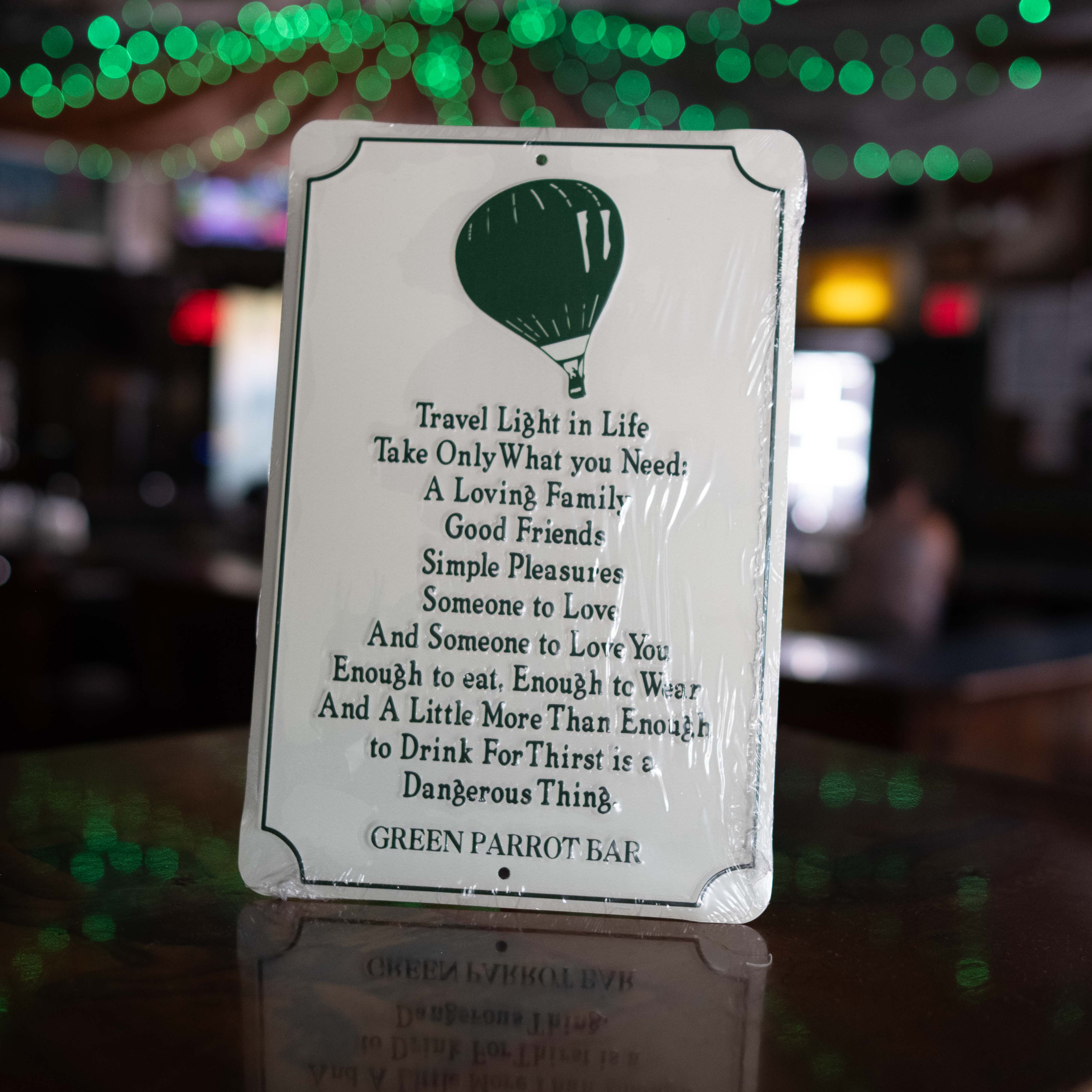 Travel Light Examples Travel Light Tin Sign – Green Parrot Gift Shop